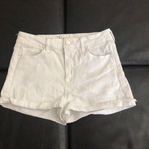 All white high rise shorts